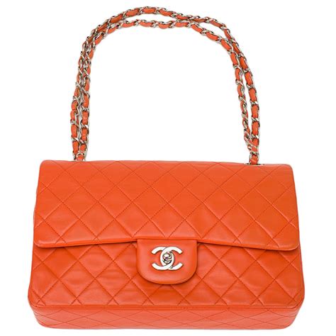 orange chanel bag with handle|Chanel boucle bag.